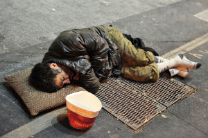 Homeless Man Sleeping On The Street